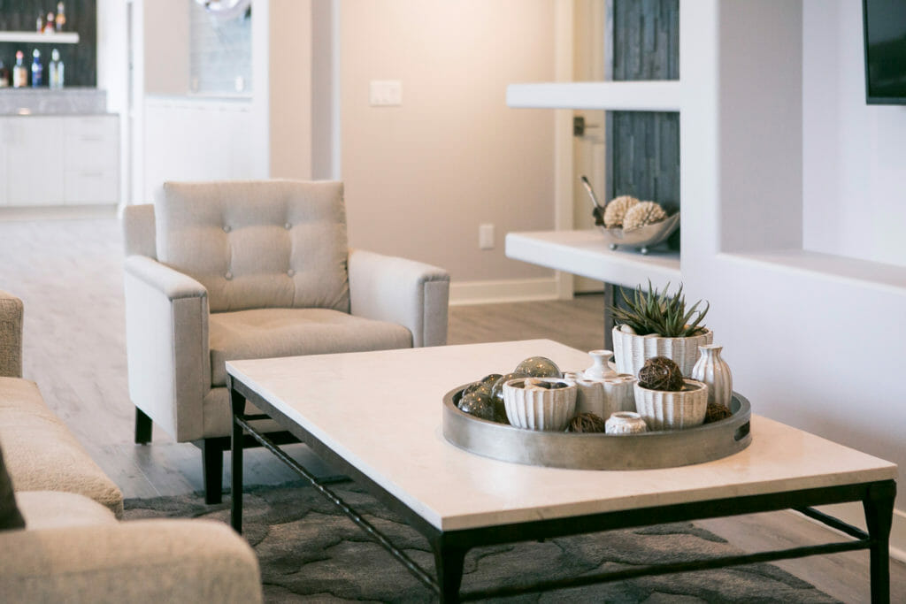 living area with plants on white table